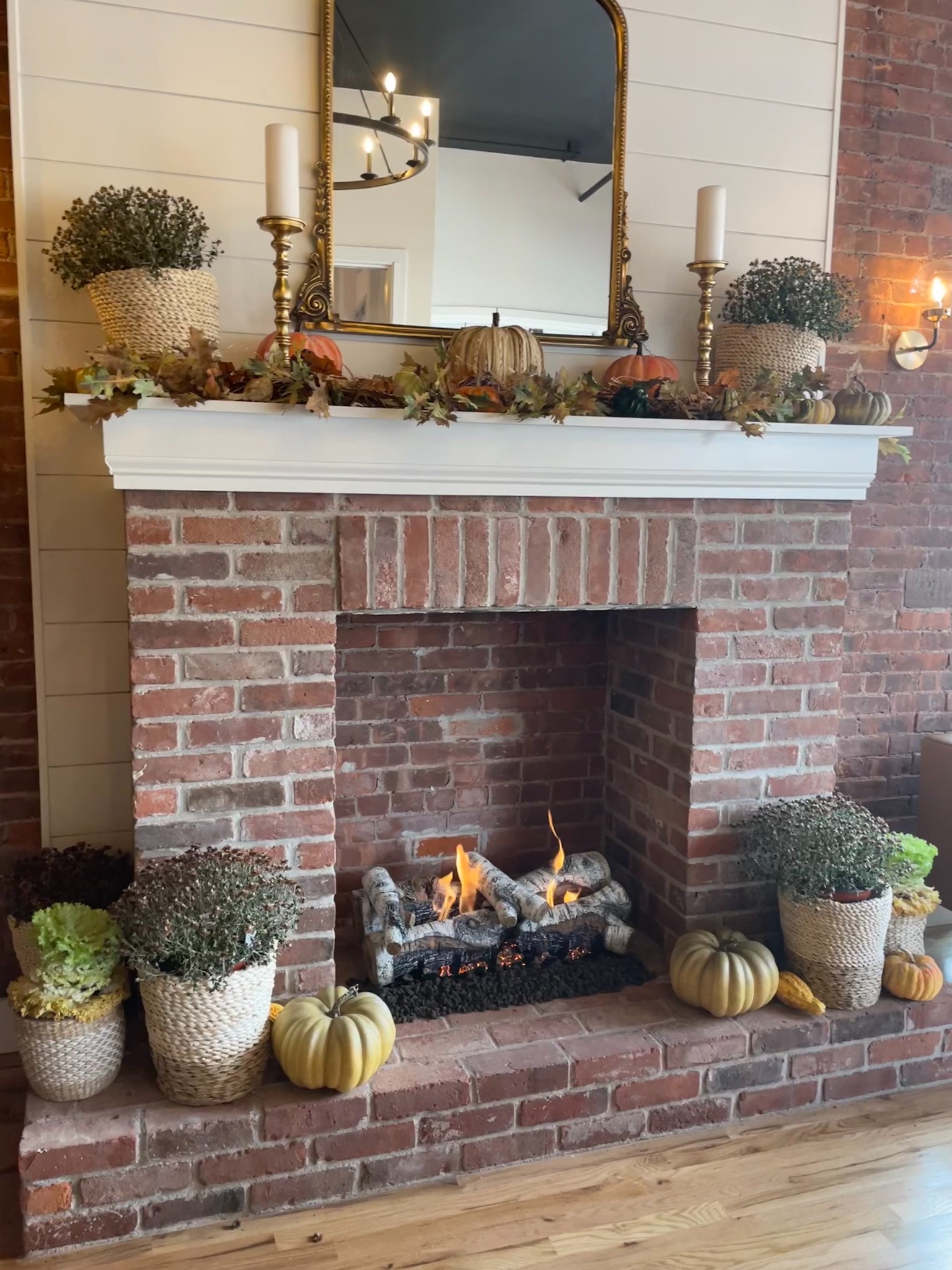 Gas log set after installation in brick fireplace